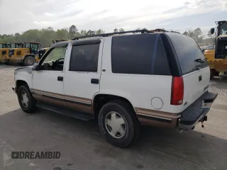 1998 Chevrolet Tahoe z VIN 1GNEK13R7WJ348565, wystawiony jako Copart lot #53375725 z przebiegiem 176 919 mil mil oraz Szkoda całkowita • Salvage title. Historia ofert i sprzedaży dostępna na DreamBid. Obrazek 2.