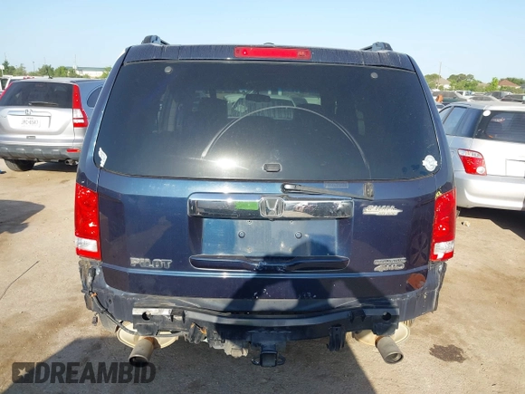 2011 Honda Pilot Touring with VIN 5FNYF4H92BB090056, listed as a IAAI auction lot 42010682 with 201,640 mi miles. Bid and sale history available at carsss.com. Image 16.