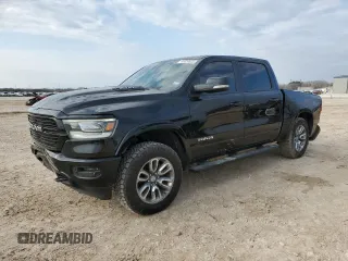 2020 Ram 1500 Laramie with VIN 1C6SRFJM4LN214264, listed as a Copart auction lot 45020525 with 106,769 mi miles and Salvage title. Bid and sale history available at DreamBid. Image 1.