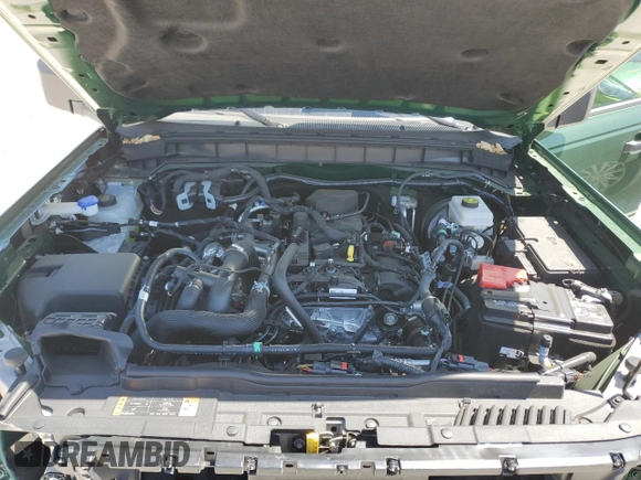 2024 Ford Bronco Big Bend with VIN 1FMDE7BH0RLB23240, listed as a Copart auction lot 52766855 with 1,283 mi miles and Salvage Title. Bid and sale history available at DreamBid. Image 12.