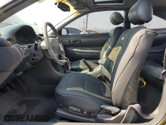 2000 Toyota Solara SE with VIN 2T1CF28P0YC337293, listed as a Copart auction lot 70659044 with 214,172 mi miles and Salvage Title. Bid and sale history available at DreamBid. Image 7.