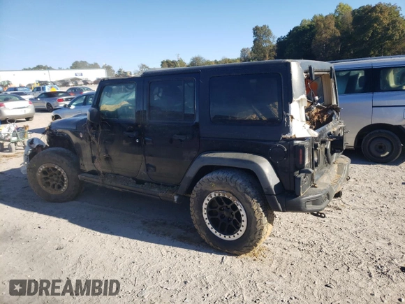 2016 Jeep Wrangler Unlimited Rubicon Hard Rock with VIN 1C4BJWFG4GL137772, listed as a Copart auction lot 82972494 with 0 mi miles and Salvage Title. Bid and sale history available at carsss.com. Image 2.
