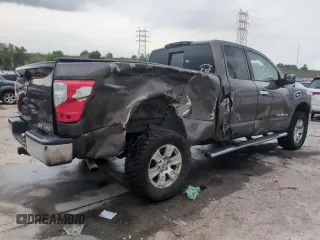 2017 Nissan Titan S z VIN 1N6AA1CJ2HN553031, wystawiony jako Copart lot #59764065 z przebiegiem 148 012 mil mil oraz Szkoda całkowita • Salvage title. Historia ofert i sprzedaży dostępna na DreamBid. Obrazek 3.