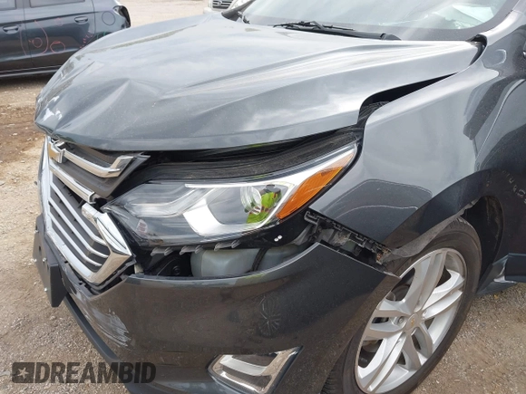 2018 Chevrolet Equinox Premier with VIN 2GNAXWEX5J6202082, listed as a IAAI auction lot 40008794 with 110,735 mi miles and . Bid and sale history available at carsss.com. Image 17.