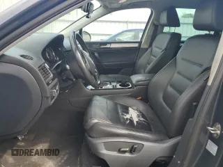 2012 Volkswagen Touareg Sport with VIN WVGEK9BP7CD006059, listed as a Copart auction lot 49411245 with 202,323 mi miles and Clean Title. Bid and sale history available at DreamBid. Image 7.