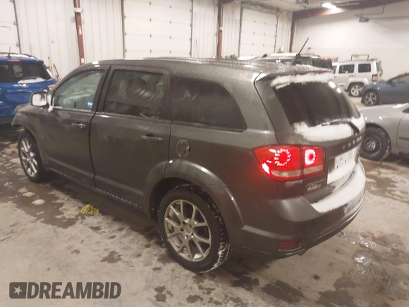 2016 Dodge Journey R/T with VIN 3C4PDCEGXGT212878, listed as a IAAI auction lot 41383369 with 227,652 mi miles and . Bid and sale history available at carsss.com. Image 3.