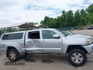 2013 Toyota Tacoma with VIN 3TMMU4FN1DM055477, listed as a IAAI auction lot 42306479 with 191,792 mi miles and . Bid and sale history available at DreamBid. Image 13.