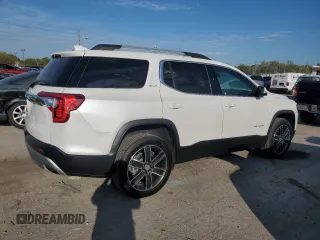 2022 GMC Acadia SLT z VIN 1GKKNML46NZ182732, wystawiony jako Copart lot #73033414 z przebiegiem 36 886 mil mil oraz Czysty tytuł • Clean title. Historia ofert i sprzedaży dostępna na DreamBid. Obrazek 3.