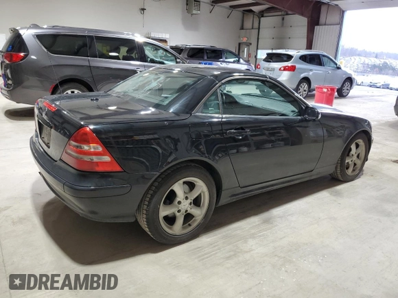 2003 Mercedes-Benz SLK 320 with VIN WDBKK65F23F277574, listed as a Copart auction lot 82523004 with 112,143 mi miles and Clean title. Bid and sale history available at DreamBid. Image 3.