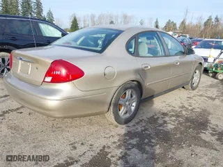 2001 Ford Taurus SEL with VIN 1FAFP56S41G168430, listed as a IAAI auction lot 41675537 with 165,336 mi miles. Bid and sale history available at carsss.com. Image 4.