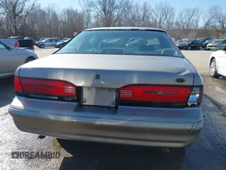 1995 Ford Thunderbird LX with VIN 1FALP62W9SH206490, listed as a IAAI auction lot 41744430 with 111,365 mi miles. Bid and sale history available at carsss.com. Image 16.