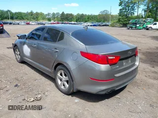 2015 Kia Optima LX z VIN 5XXGM4A76FG518823, wystawiony jako IAAI lot #42294278 z przebiegiem 58 551 mil mil oraz . Historia ofert i sprzedaży dostępna na DreamBid. Obrazek 3.
