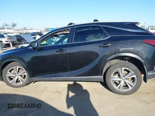 2023 Lexus RX 350 with VIN 2T2BAMBAXPC005107, listed as a IAAI auction lot 42287535 with 51,672 mi miles and . Bid and sale history available at DreamBid. Image 13.
