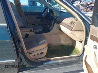 1998 BMW 7 Series 740il with VIN WBAGJ8323WDM13455, listed as a IAAI auction lot 41888636 with 1 mi miles. Bid and sale history available at carsss.com. Image 5.
