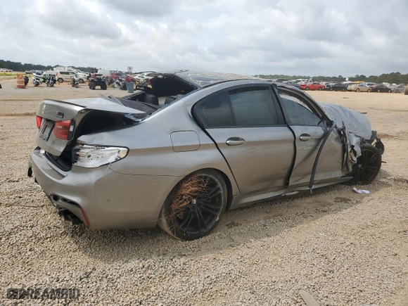 2019 BMW M5 with VIN WBSJF0C57KB447306, listed as a Copart auction lot 71837424 with 0 mi miles and Salvage Title. Bid and sale history available at carsss.com. Image 3.