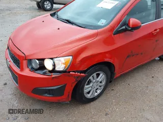 2013 Chevrolet Sonic LT with VIN 1G1JC6SHXD4139822, listed as a IAAI auction lot 41672289 with 87,899 mi miles. Bid and sale history available at carsss.com. Image 6.