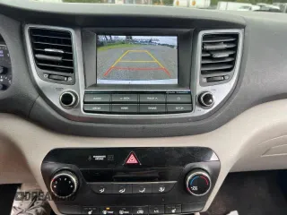 2018 Hyundai Tucson SEL z VIN KM8J33A40JU676727, wystawiony jako Copart lot #87532055 z przebiegiem 128 554 mil mil oraz Czysty tytuł • Clean title. Historia ofert i sprzedaży dostępna na DreamBid. Obrazek 9.
