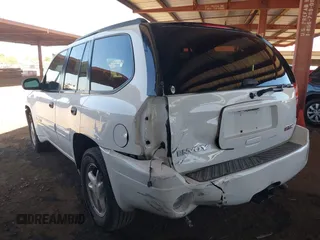 2004 GMC Envoy SLT with VIN 1GKDS13S442217242, listed as a IAAI auction lot 42573887 with 210,296 mi miles and . Bid and sale history available at DreamBid. Image 3.