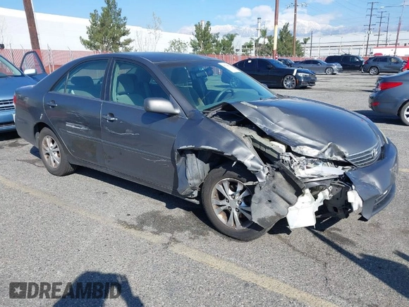 2005 Toyota Camry LE with VIN 4T1BF32K25U603812, listed as a IAAI auction lot 41740671 with 242,316 mi miles and . Bid and sale history available at DreamBid. Image 1.