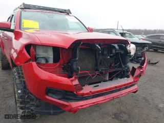 2019 Toyota Tacoma 4WD SR with VIN 3TMCZ5AN0KM202251, listed as a IAAI auction lot 41676243 with 116,911 mi miles. Bid and sale history available at carsss.com. Image 6.