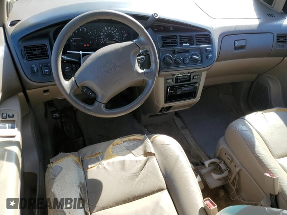 1999 Toyota Sienna LE with VIN 4T3ZF13C0XU144476, listed as a Copart auction lot 48185235 with 183,940 mi miles and Salvage title. Bid and sale history available at DreamBid. Image 8.