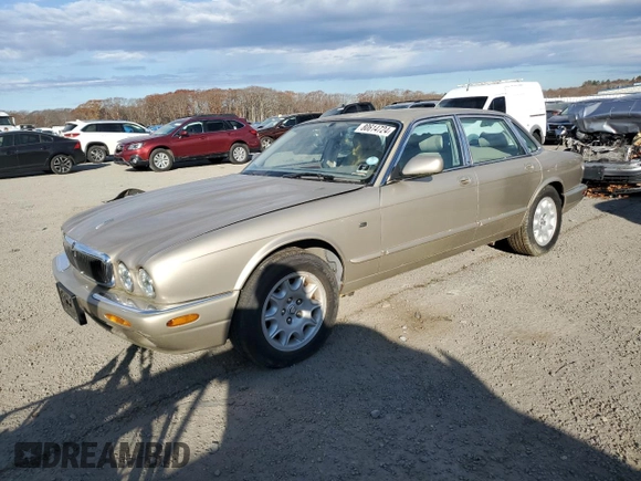 1998 Jaguar XJ with VIN SAJHX1248WC853422, listed as a Copart auction lot 80614724 with 76,269 mi miles and Non repairable. Bid and sale history available at DreamBid. Image 1.