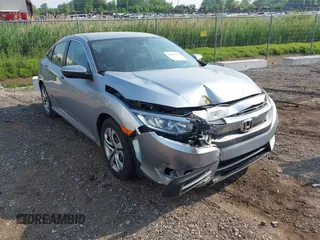 2017 Honda Civic LX z VIN 19XFC2F56HE010325, wystawiony jako IAAI lot #42419574 z przebiegiem 62 437 mil mil oraz . Historia ofert i sprzedaży dostępna na DreamBid. Obrazek 1.