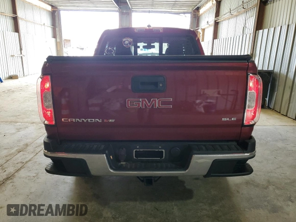 2018 GMC Canyon 4WD SLE z VIN 1GTG6CENXJ1132259, wystawiony jako Copart lot #49834865 z przebiegiem 88 262 mil mil oraz Szkoda całkowita • Salvage title. Historia ofert i sprzedaży dostępna na DreamBid. Obrazek 6.
