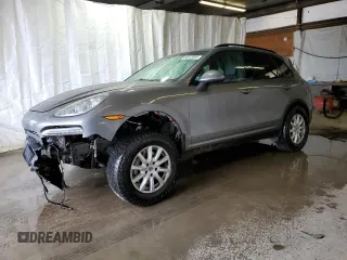 2012 Porsche Cayenne S z VIN WP1AB2A26CLA40790, wystawiony jako Copart lot #50972885 z przebiegiem 83 953 mil mil oraz Szkody całkowita. Historia ofert i sprzedaży dostępna na DreamBid. Obrazek 1.