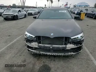 2017 BMW 5 Series 540i with VIN WBAJE5C33HG915675, listed as a Copart auction lot 55857135 with 57,330 mi miles and Salvage title. Bid and sale history available at DreamBid. Image 14.