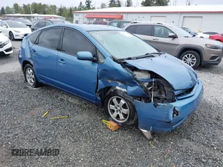 2005 Toyota Prius z VIN JTDKB20U150118440, wystawiony jako IAAI lot #42090135 z przebiegiem 263 095 mil mil oraz . Historia ofert i sprzedaży dostępna na DreamBid. Obrazek 1.