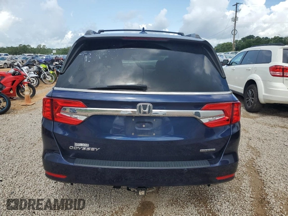 2019 Honda Odyssey Touring z VIN 5FNRL6H8XKB027156, wystawiony jako Copart lot #60735455 z przebiegiem 100 044 mil mil oraz Szkoda całkowita • Salvage title. Historia ofert i sprzedaży dostępna na DreamBid. Obrazek 6.