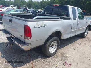 2000 Ford F-150 XL with VIN 1FTRX18L1YNA13975, listed as a IAAI auction lot 42397187 with 235,471 mi miles and . Bid and sale history available at DreamBid. Image 4.
