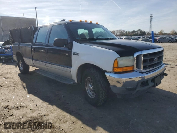 2001 Ford Super Duty F-250 XL with VIN 1FTNW20L11ED23827, listed as a Copart auction lot 82335324 with 223,835 mi miles and Salvage Title. Bid and sale history available at carsss.com. Image 4.