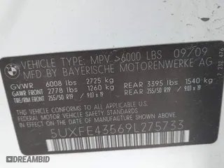 2009 BMW X5 30i with VIN 5UXFE43569L275733, listed as a IAAI auction lot 41897558 with 154,192 mi miles. Bid and sale history available at carsss.com. Image 9.