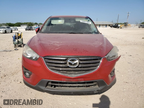2016 Mazda CX-5 Touring with VIN JM3KE2CYXG0638247, listed as a Copart auction lot 53087305 with 0 mi miles and Salvage Title. Bid and sale history available at carsss.com. Image 5.