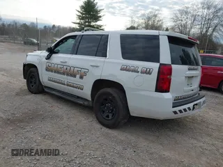 2020 Chevrolet Tahoe Commercial with VIN 1GNLCDEC7LR199179, listed as a IAAI auction lot 41502623 with 87,271 mi miles and . Bid and sale history available at DreamBid. Image 3.