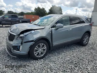 2023 Cadillac XT5 AWD Premium Luxury with VIN 1GYKNDRS5PZ165578, listed as a Copart auction lot 62304325 with 46,013 mi miles and Salvage title. Bid and sale history available at DreamBid. Image 1.