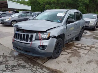 2014 Jeep Compass Sport with VIN 1C4NJCBA3ED769764, listed as a IAAI auction lot 42147739 with 141,979 mi miles. Bid and sale history available at carsss.com. Image 2.