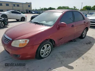 2007 Kia Spectra EX z VIN KNAFE122475378574, wystawiony jako Copart lot #56921925 z przebiegiem 142 268 mil mil oraz Szkoda całkowita • Salvage title. Historia ofert i sprzedaży dostępna na DreamBid. Obrazek 1.
