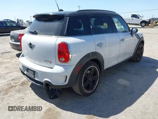 2011 MINI Countryman S z VIN WMWZC3C50BWM26002, wystawiony jako IAAI lot #42383758 z przebiegiem 188 443 mil mil oraz . Historia ofert i sprzedaży dostępna na DreamBid. Obrazek 4.