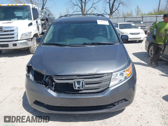 2012 Honda Odyssey EX-L with VIN 5FNRL5H69CB047425, listed as a IAAI auction lot 42064979 with 242,409 mi miles and . Bid and sale history available at carsss.com. Image 13.