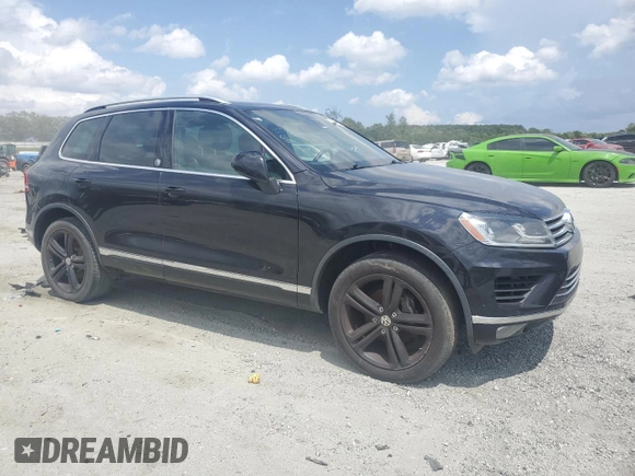 2017 Volkswagen Touareg Wolfsburg Edition with VIN WVGRF7BP6HD004806, listed as a Copart auction lot 61754565 with 160,012 mi miles and Clean title. Bid and sale history available at DreamBid. Image 4.