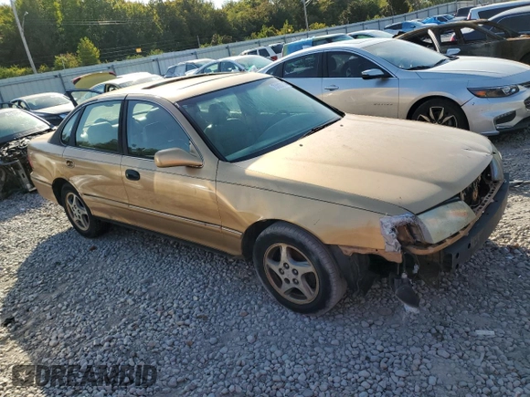 1998 Toyota Avalon XL with VIN 4T1BF18B3WU222354, listed as a Copart auction lot 75029214 with 377,315 mi miles and Non Repairable. Bid and sale history available at DreamBid. Image 4.