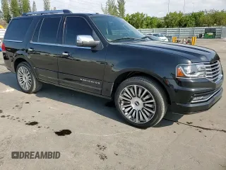 2015 Lincoln Navigator z VIN 5LMJJ2HT5FEJ06248, wystawiony jako Copart lot #52876645 z przebiegiem 270 523 mil mil oraz Szkoda całkowita • Salvage title. Historia ofert i sprzedaży dostępna na DreamBid. Obrazek 12.