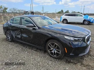 2024 BMW i5 eDrive40 with VIN WBY33FK02RCR91118, listed as a Copart auction lot 53308205 with Not Provided miles and Clean Title. Bid and sale history available at DreamBid. Image 4.