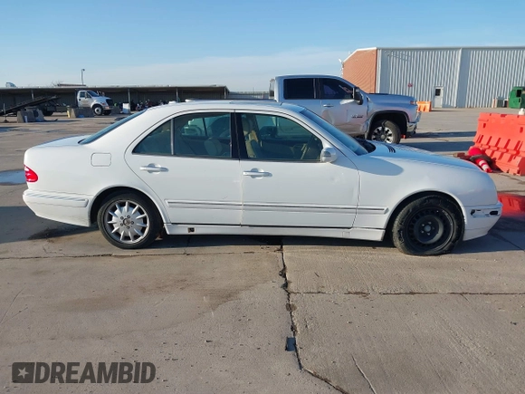2001 Mercedes-Benz E-Class with VIN WDBJF65J91B249540, listed as a IAAI auction lot 41130248 with 107,582 mi miles. Bid and sale history available at carsss.com. Image 13.