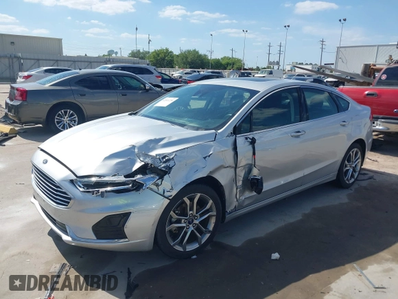 2019 Ford Fusion SEL with VIN 3FA6P0CD2KR116863, listed as a IAAI auction lot 42011256 with 72,676 mi miles. Bid and sale history available at carsss.com. Image 2.