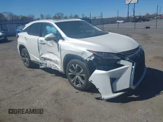 2018 Lexus RX 350 z VIN 2T2BZMCAXJC144930, wystawiony jako IAAI lot #41857778 z przebiegiem 108 191 mil mil oraz . Historia ofert i sprzedaży dostępna na DreamBid. Obrazek 1.