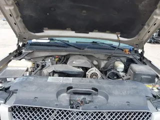 2005 Chevrolet Silverado 1500 LS with VIN 1GCEK19T65Z194720, listed as a IAAI auction lot 42157104 with 156,376 mi miles. Bid and sale history available at carsss.com. Image 10.